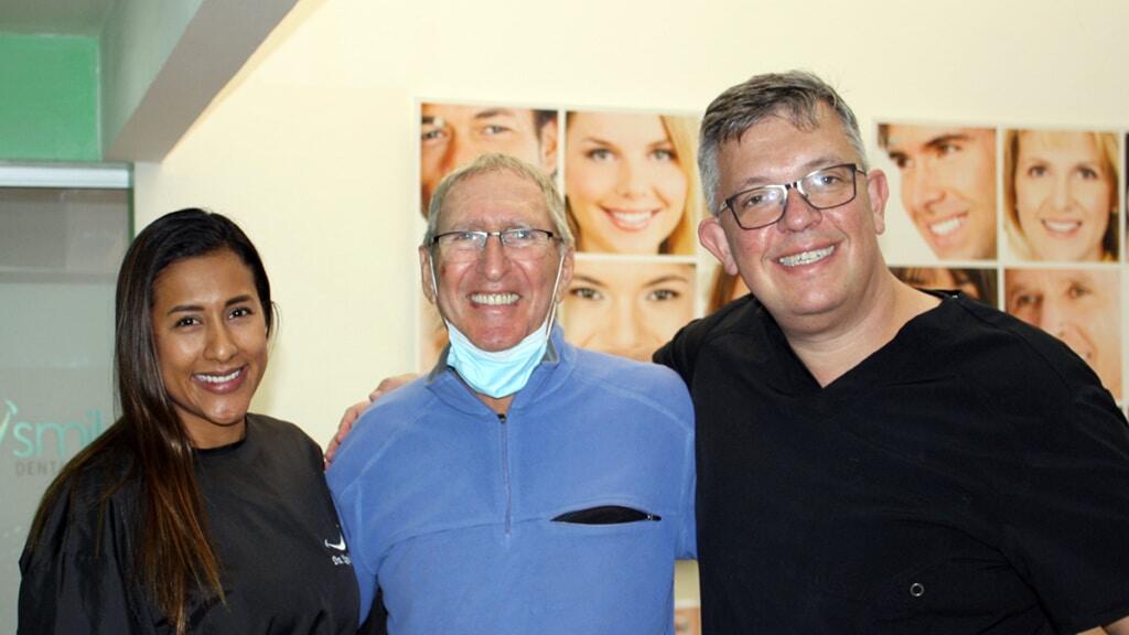 Full mouth restoration with dental implants and crowns